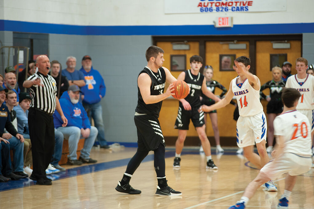 12-24 TV Ethan Colegrove looking to pass.jpg